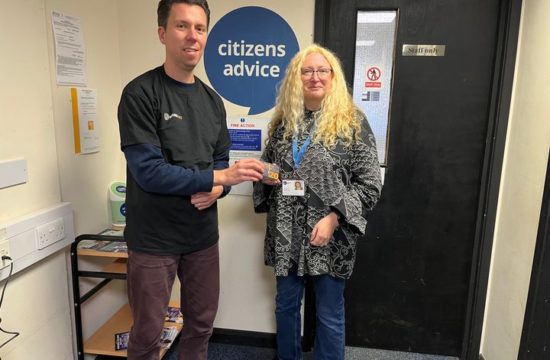 Godalming Round Table presents food vouchers to Citizens Advice South West Surrey